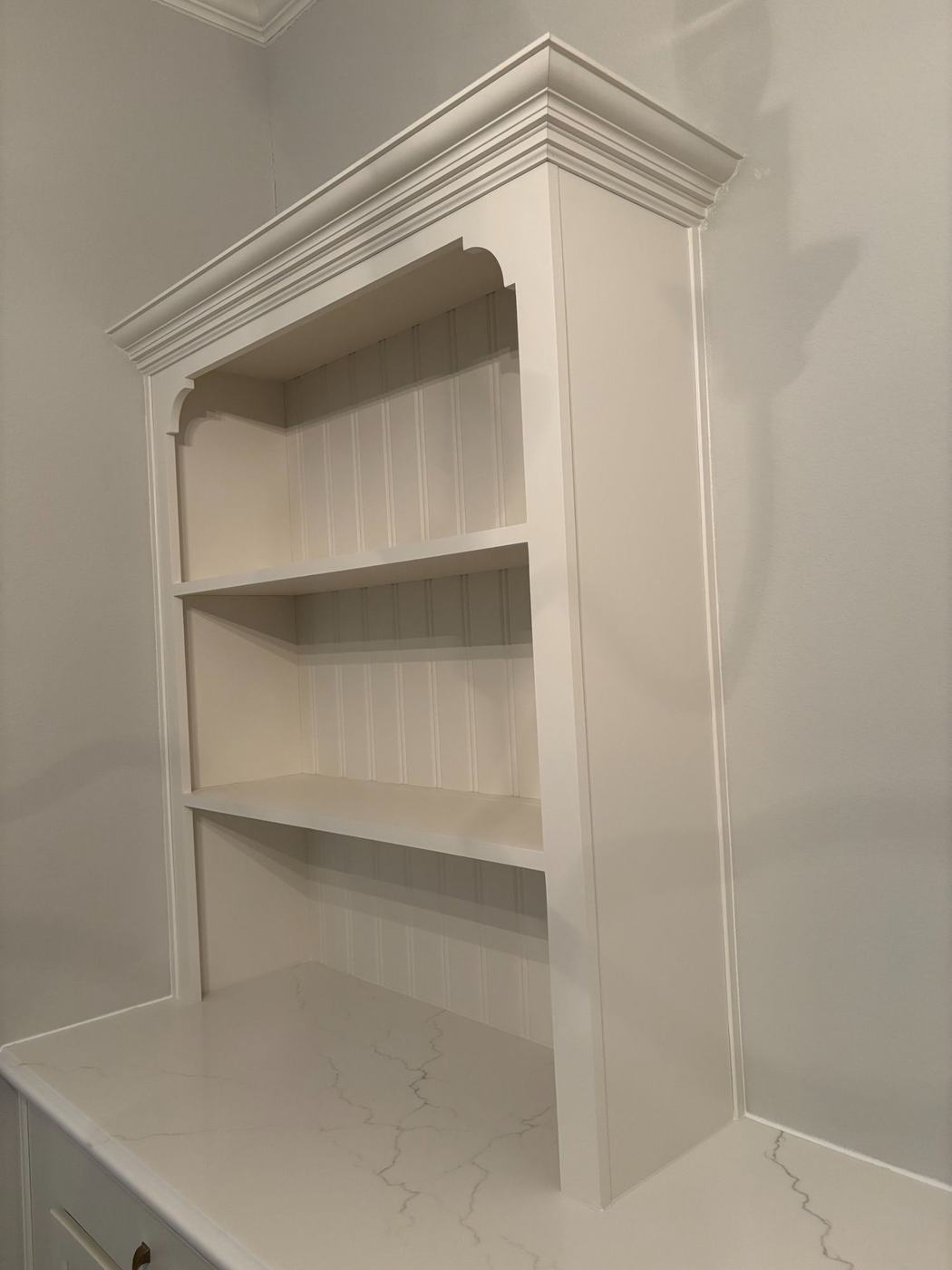 Built-in hutch — finished with beadboard back and quartz top